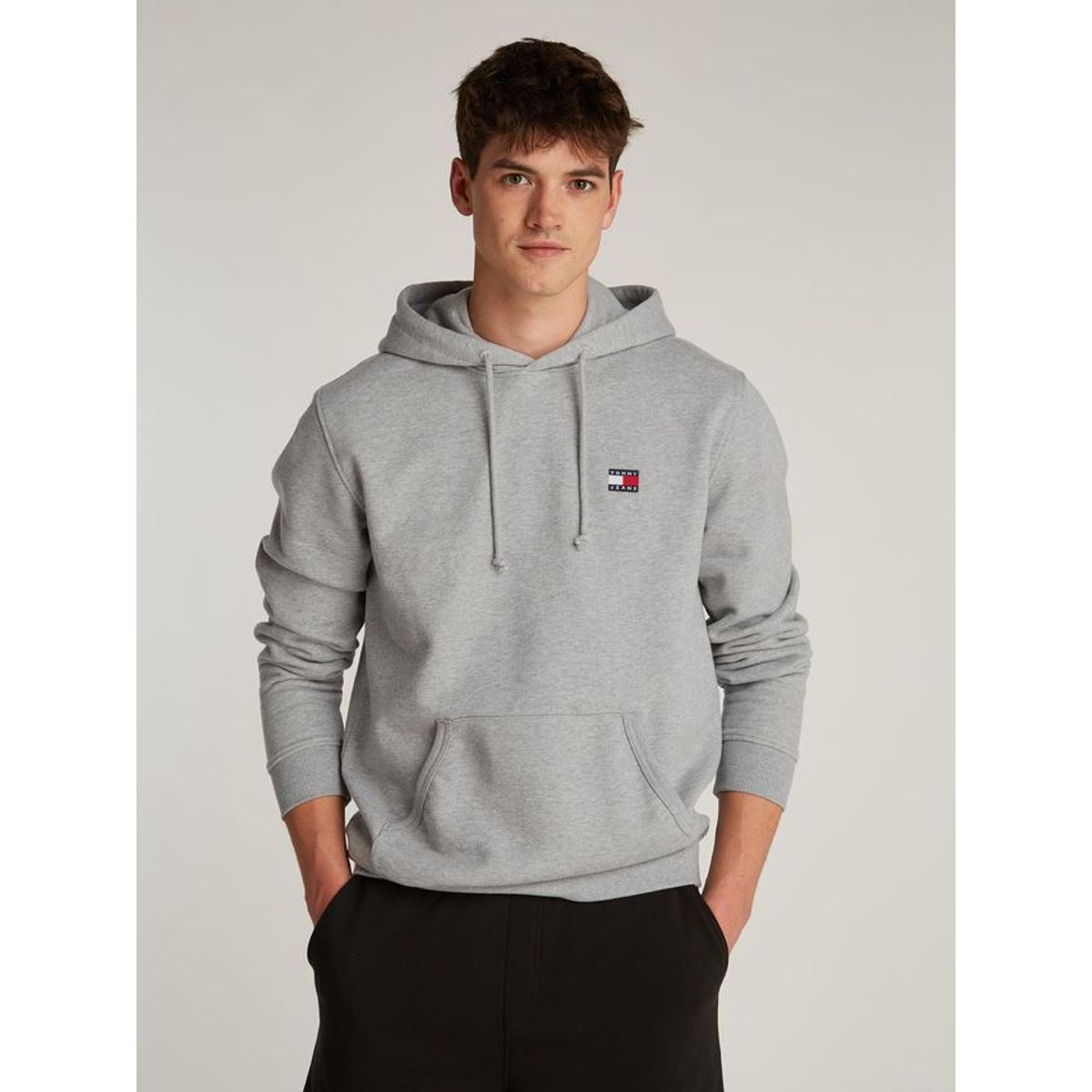 TJM REG BADGE HOODIE EXT