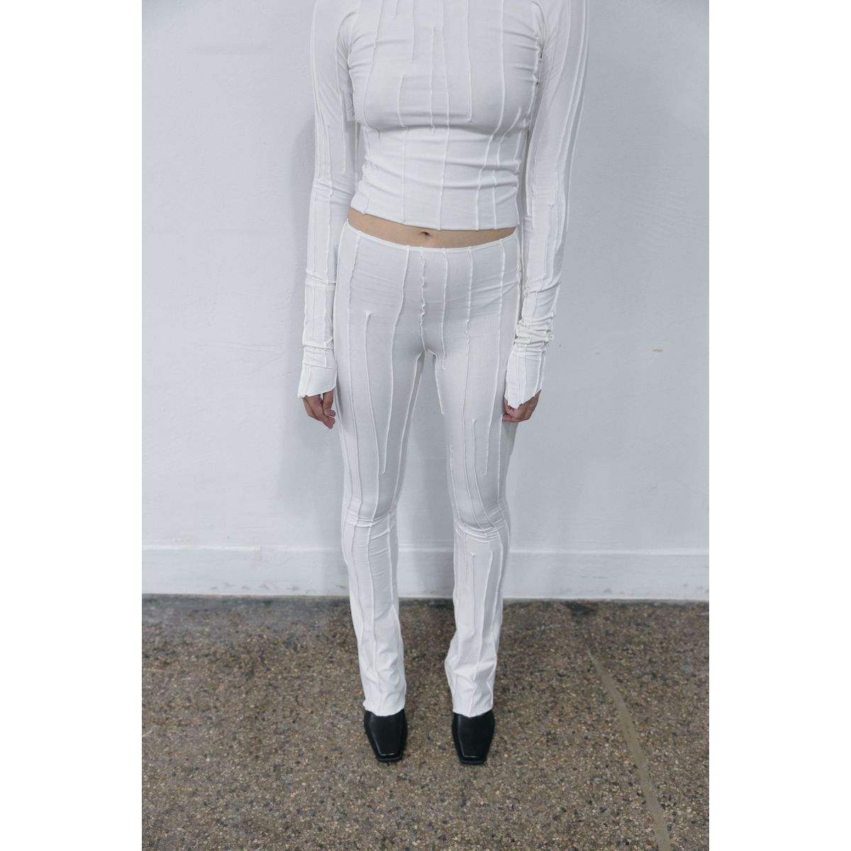 OFF-WHITE ASYMMETRIC FULL SUTURE FLARE PANTS - S/M fits a M-XL