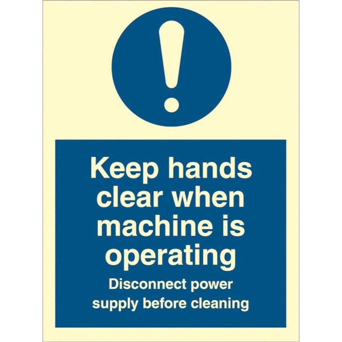 Sign IMO Keep hands clear when machine is operatin